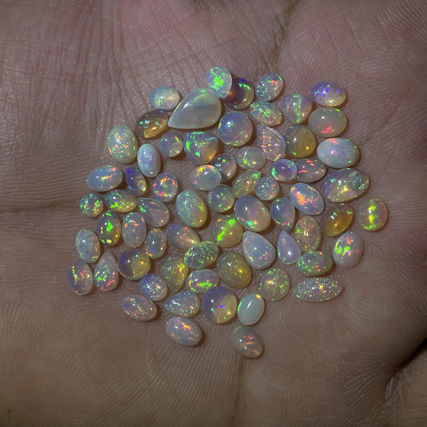 Captivating Beauty: Natural Ethiopian Opal Cabochon - Average Size of 0.3 cts