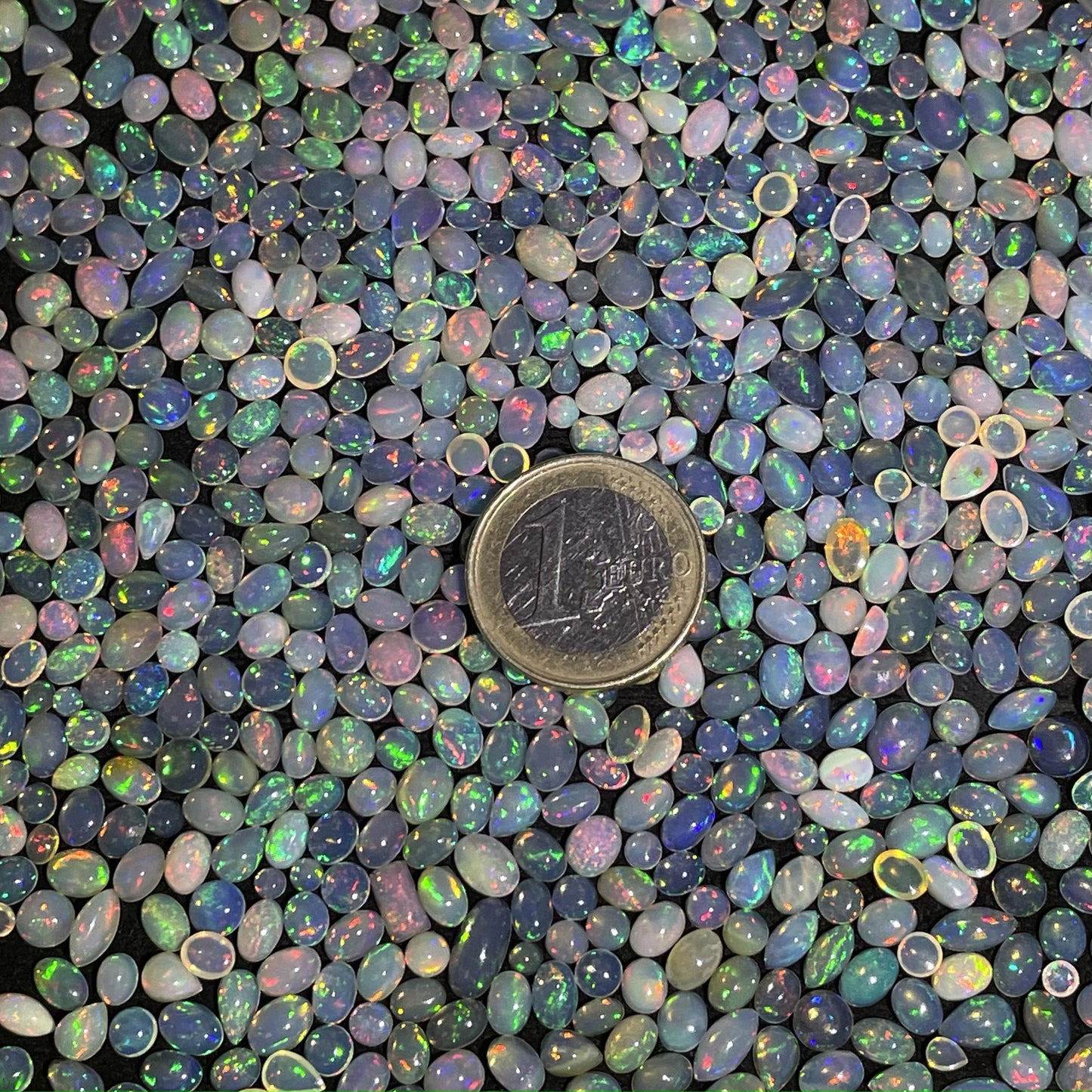 Captivating Beauty: Natural Ethiopian Opal Cabochon - Average Size of 0.3 cts