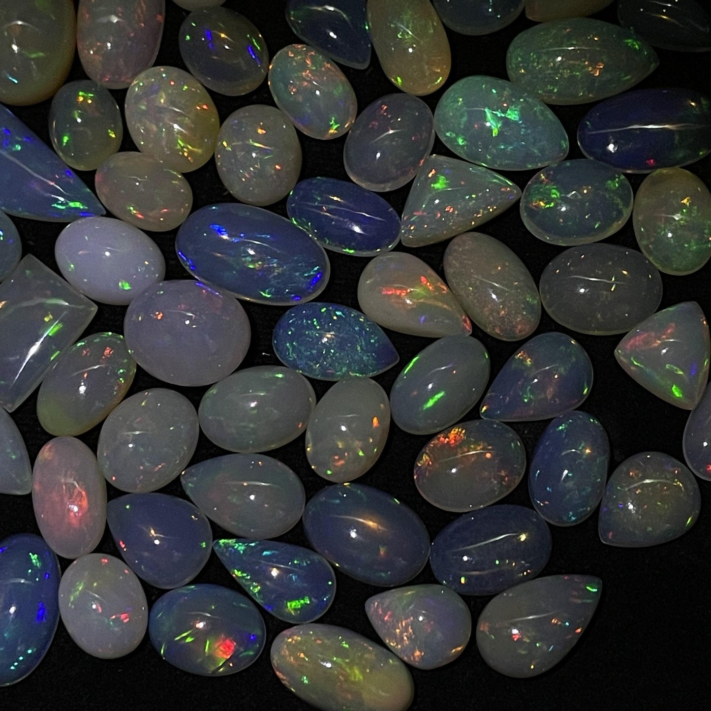 Ethereal Beauty Unveiled: Natural Ethiopian Opal Cabochon - Captivating 5 cts of Exquisite Splendor