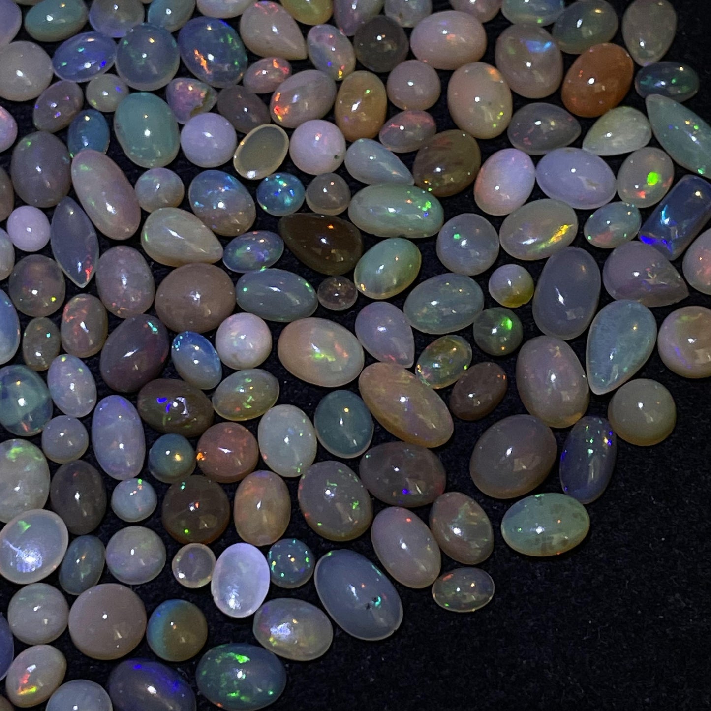 Natural Ethiopian Opal Cabochon: Average Size of 0.4 cts Natural Beauty