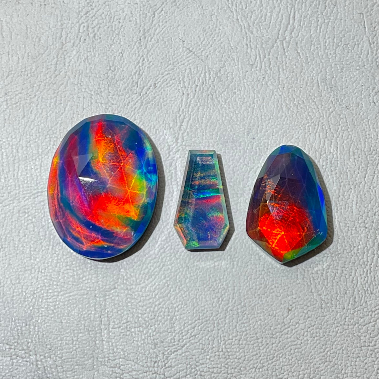 Faceted Aurora opal Rainbow Lab created Doubled