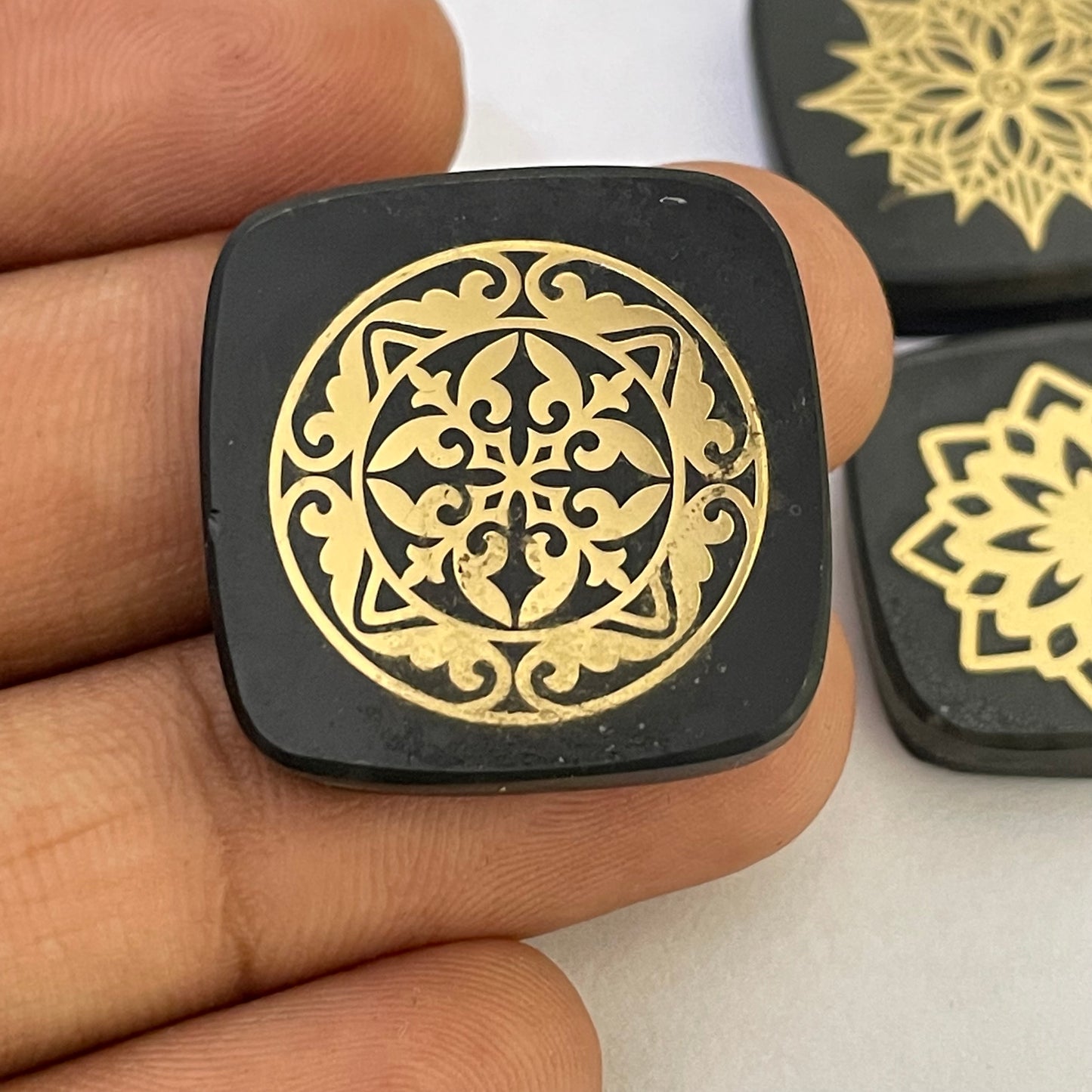 Black Metal doubled Golden Design gemstone offers a luxurious look. (Lab-Created)