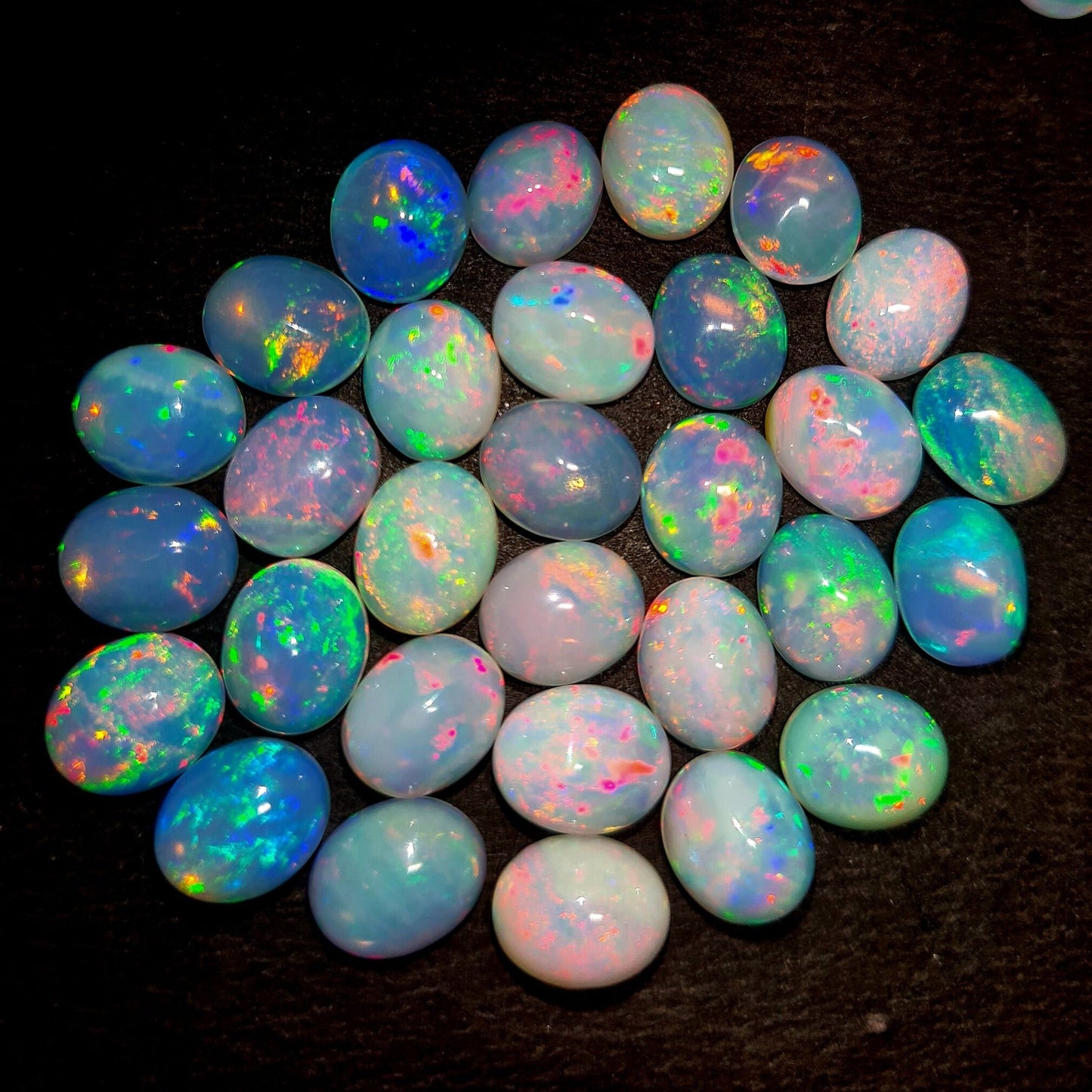 Vivid Color Oval Ethiopian Opal Gemstone 45.58 Carats - Moriartys Gem Art