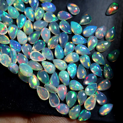 Gorgeous Multi Play Fire Ethiopian Opal 5x8 mm Pear Cabochon, Natural Ethiopian Opal Multi Fire Opal Cabochon, Loose Opal Cabochon Gemstone. (Natural)