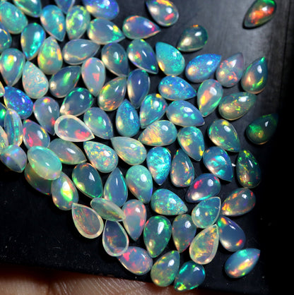 Gorgeous Multi Play Fire Ethiopian Opal 5x8 mm Pear Cabochon, Natural Ethiopian Opal Multi Fire Opal Cabochon, Loose Opal Cabochon Gemstone. (Natural)