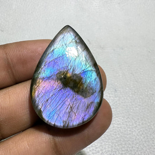 Natural Labradorite Pear Cabochon: Purple Gemstone from Madagascar