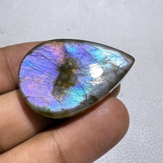 Natural Labradorite Pear Cabochon: Purple Gemstone from Madagascar