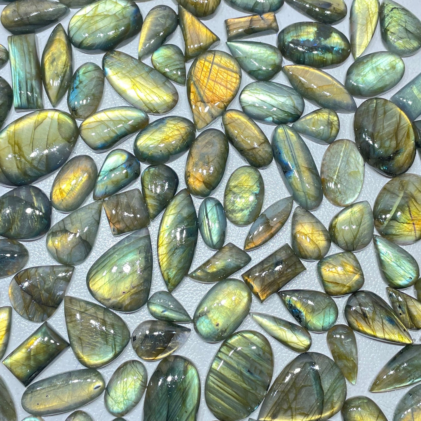 Discover the Mesmerizing Beauty of Handcrafted Yellow Flashy Labradorite Cabochons - High-Quality Gems at an Affordable Price